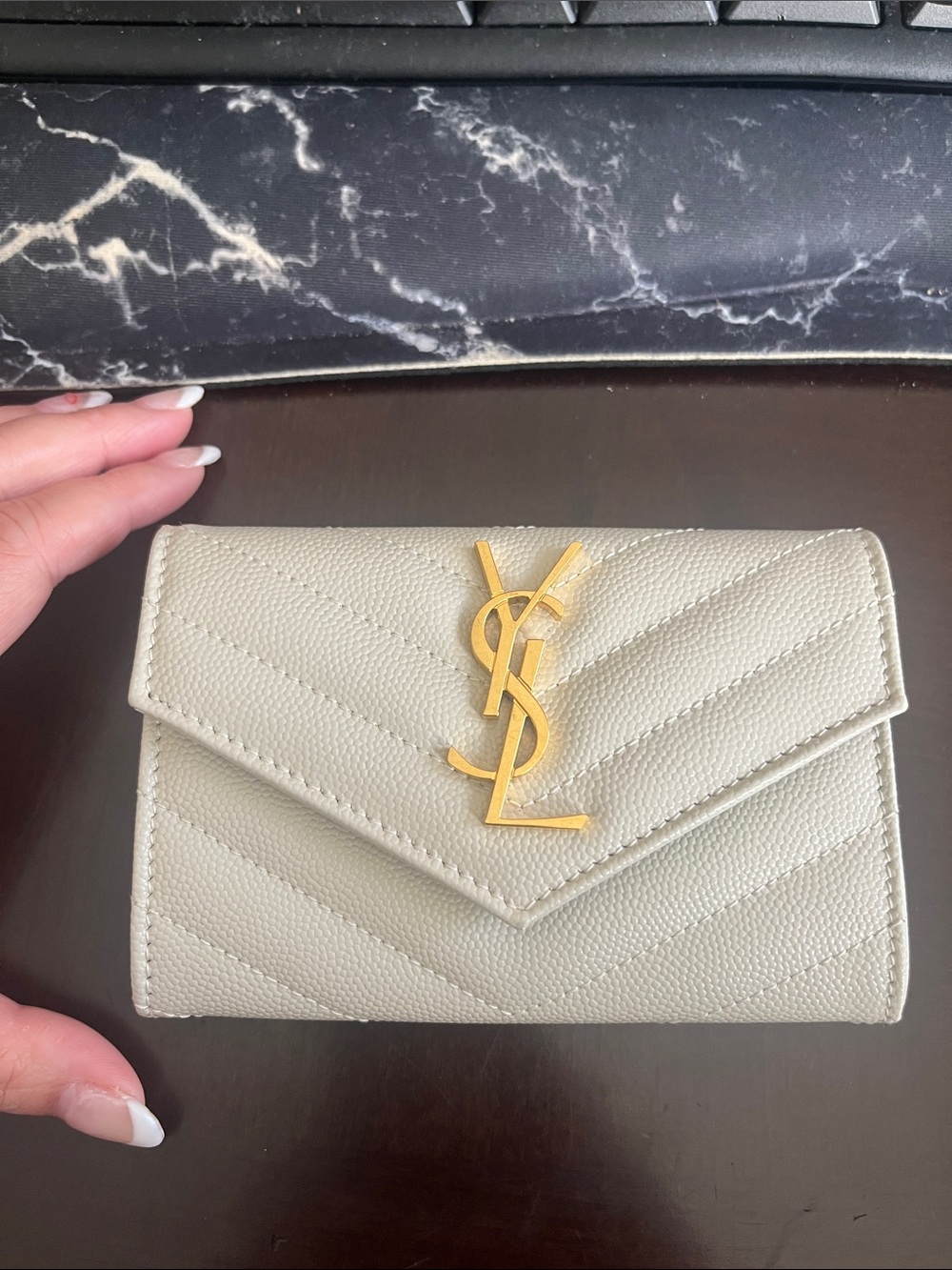 Saint Laurent Matelasse small envelope wallet in grained leather in white